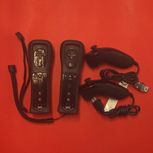 Official wii remote black - official,